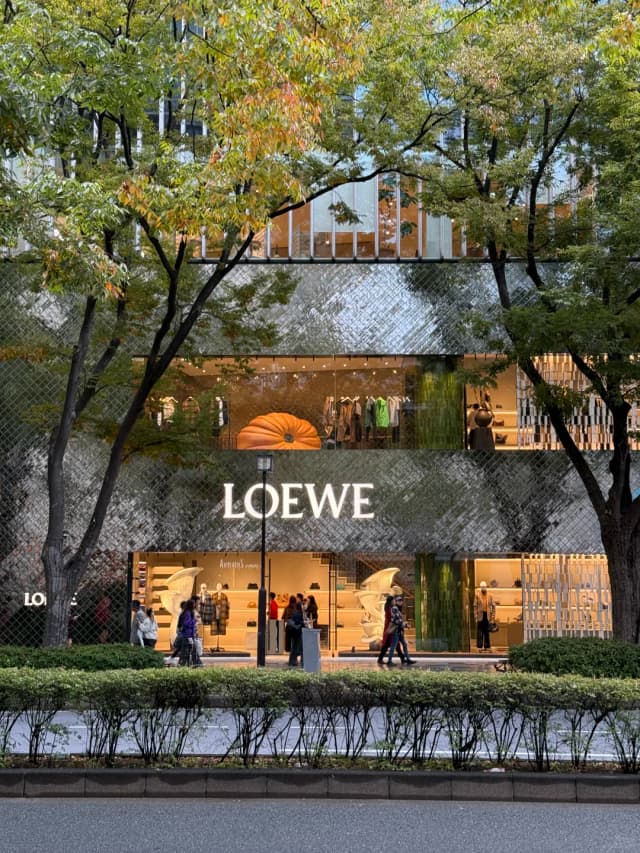 Discover Omotesando, Tokyo's 'Champs-Élysées,' an avenue famous for its elegant boutiques and stunning design architecture.